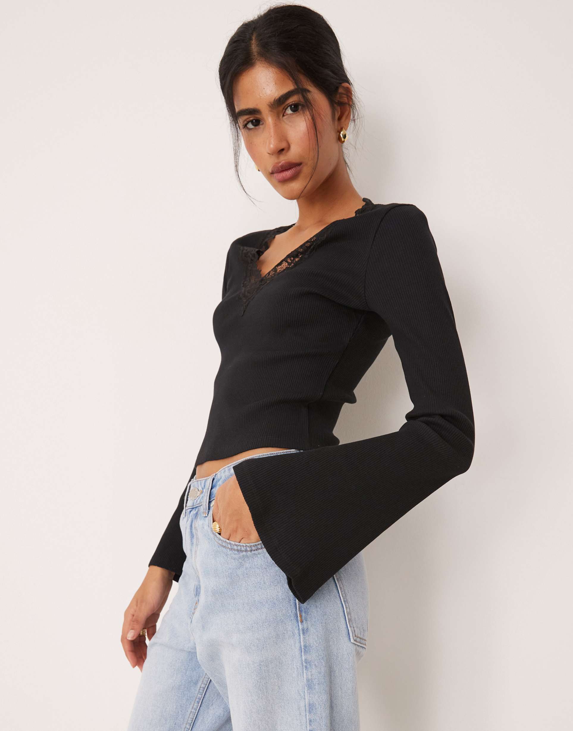 asos design rib knit v neck top with lace trim and flared sleeves in black