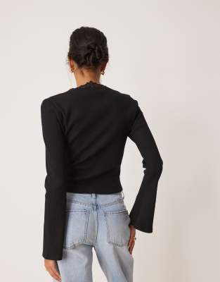 Asos Design Rib Knit V Neck Top With Lace Trim And Flared Sleeves In Black