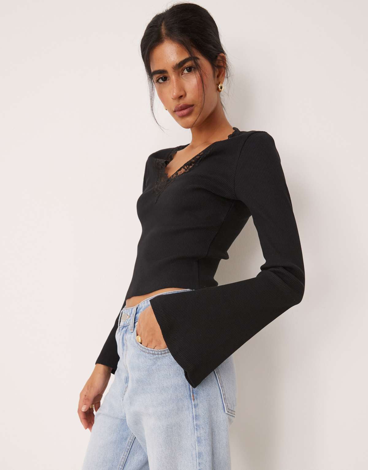 ASOS DESIGN rib v neck top with lace trim and flared sleeve in black