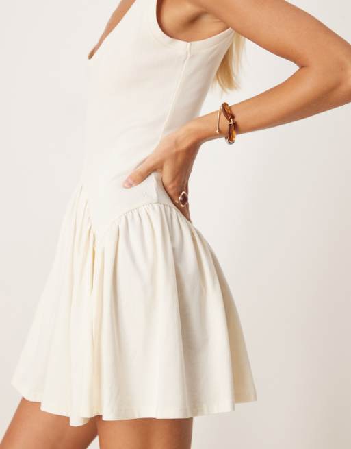 ASOS DESIGN ribbed bodice scoop mini dress with dipped waist detail in cream