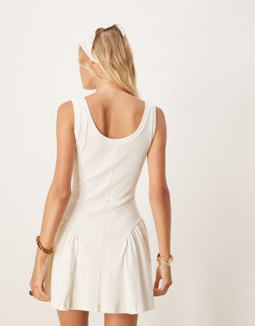 ASOS DESIGN ribbed bodice scoop mini dress with dipped waist detail in cream