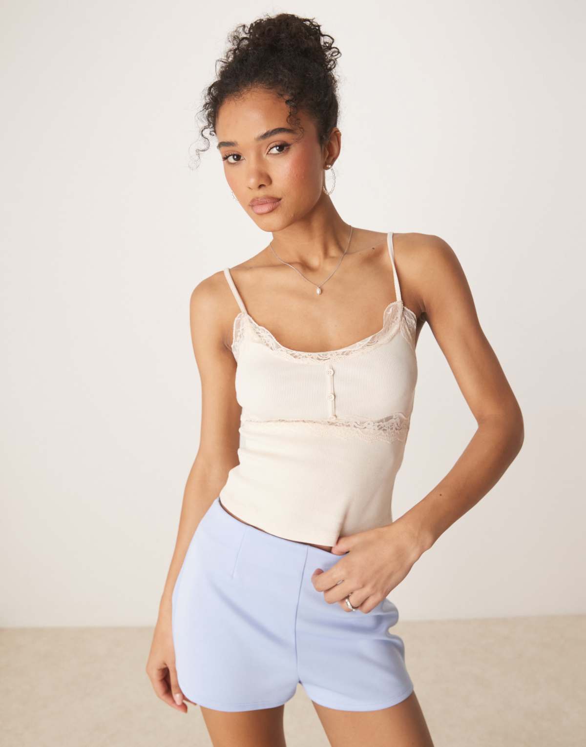 ASOS DESIGN ribbed cami top with lace and button detail in cream
