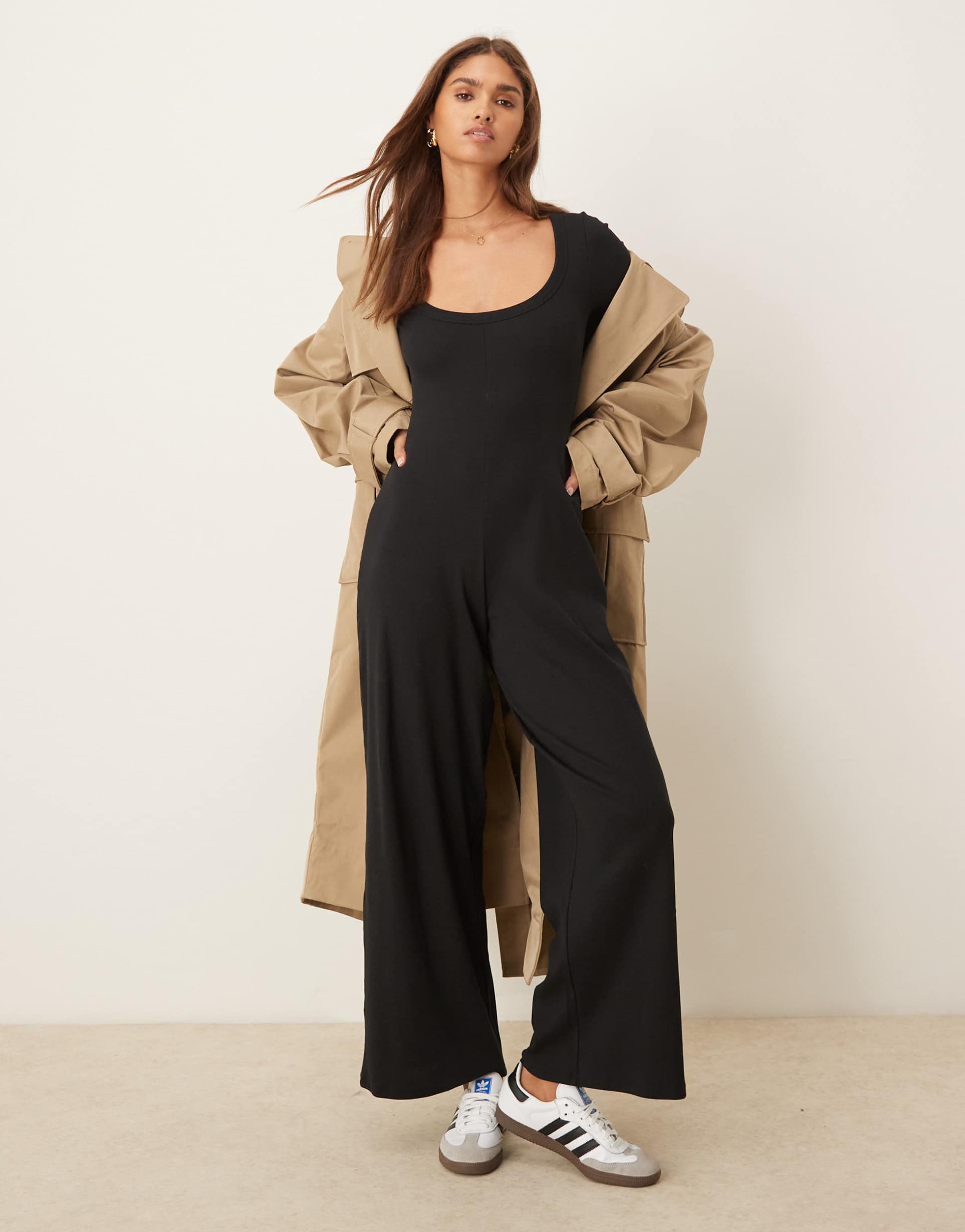 asos design ribbed long sleeve scoop neck jumpsuit in black