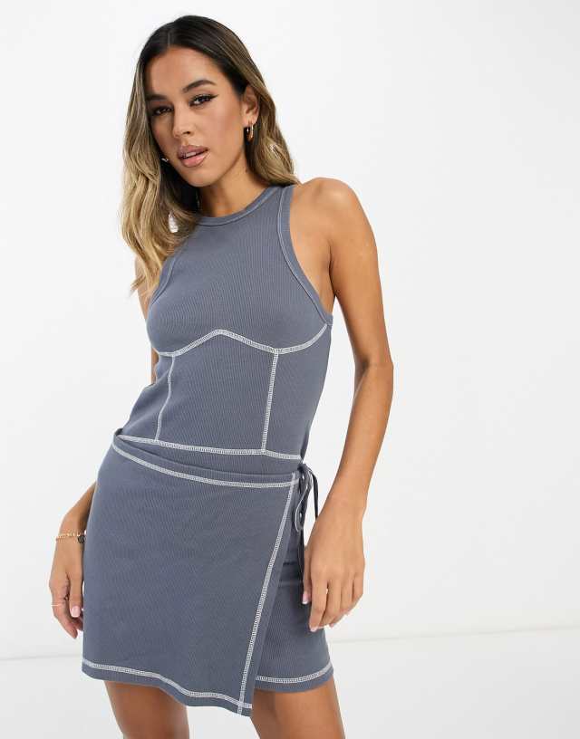 ASOS DESIGN ribbed mini dress with wrap skirt and contrast stitching in slate