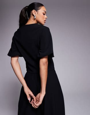 Asos Design Ribbed Puff Sleeve Structured Hook And Eye Top In Black In Black