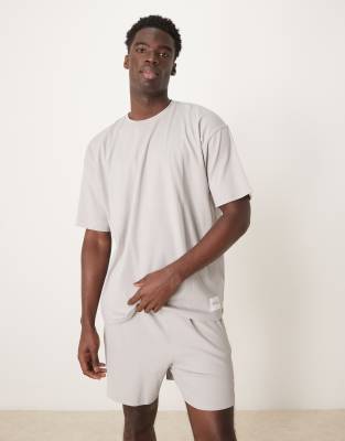 ASOS DESIGN ribbed t-shirt and short lounge set with embroidered patch in gray