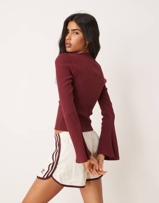 Asos Design Ribbed V Neck Top With Lace Trim And Flared Sleeve In Red