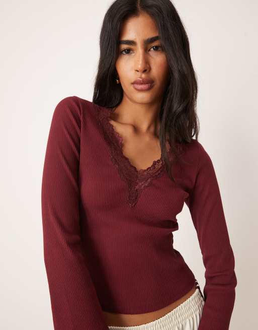 ASOS DESIGN ribbed v neck top with lace trim and flared sleeve in burgundy