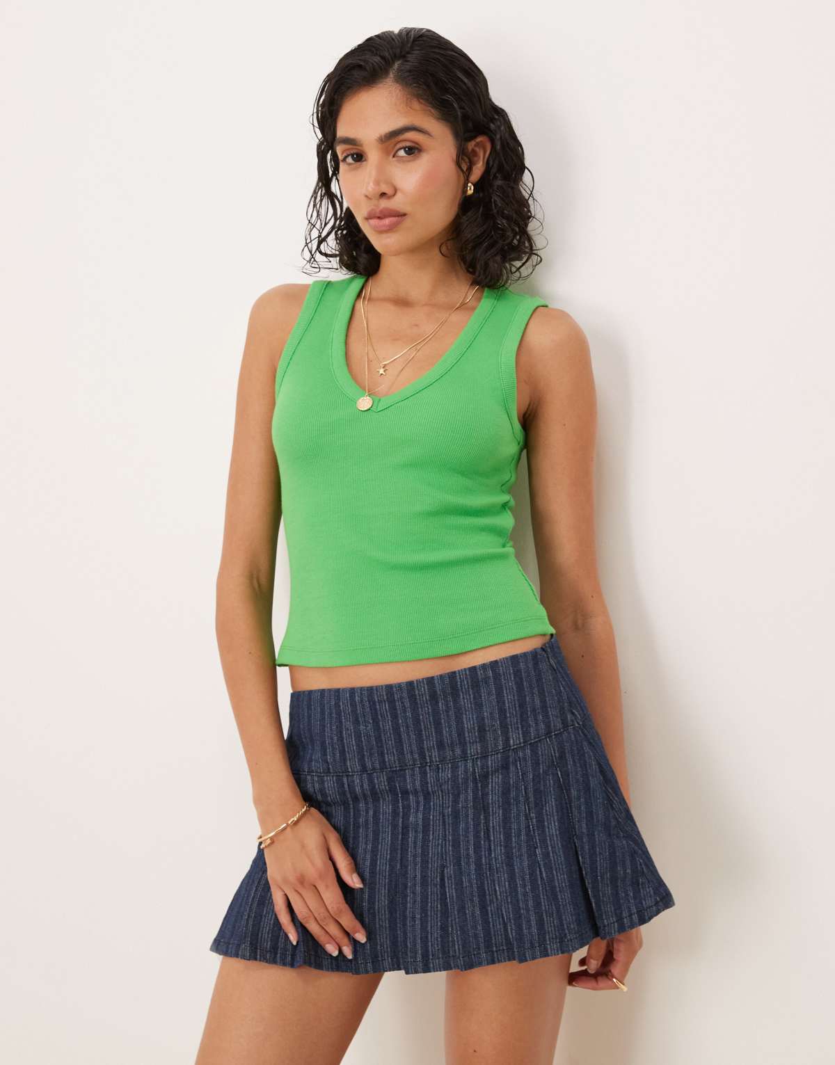 ASOS DESIGN ribbed V neck vest in green