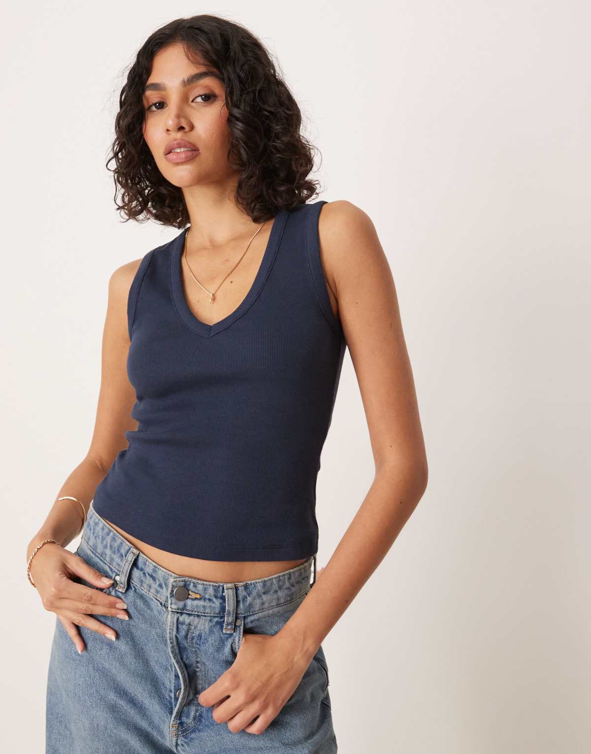 ASOS DESIGN ribbed V neck vest in navy