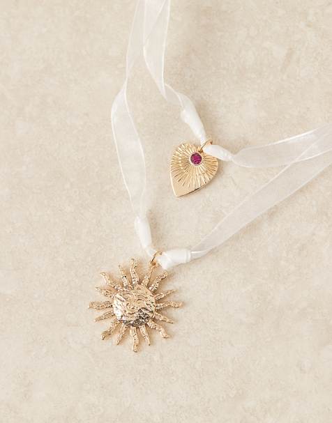 ASOS DESIGN ribbon necklace with sun charm in gold tone - view 1