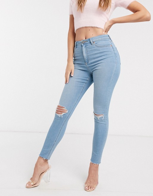 ASOS DESIGN high rise ridley 'skinny' jean in brightwash blue with rips