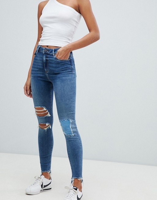 ASOS DESIGN Ridley high waist skinny jeans in extreme mid wash with ...