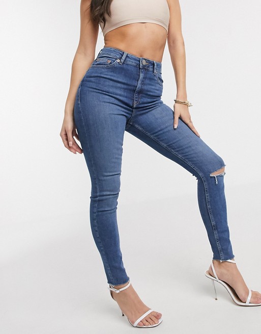 ASOS DESIGN high rise ridley 'skinny' jeans with rips in midwash blue wash