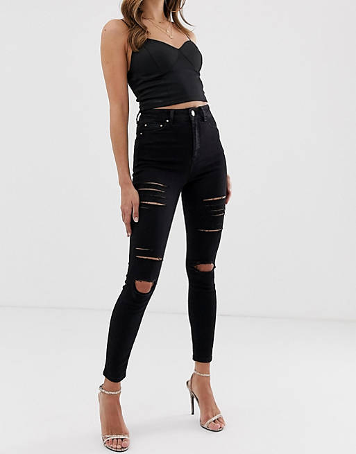 ASOS DESIGN Ridley high waisted skinny jeans in black with shredded rips