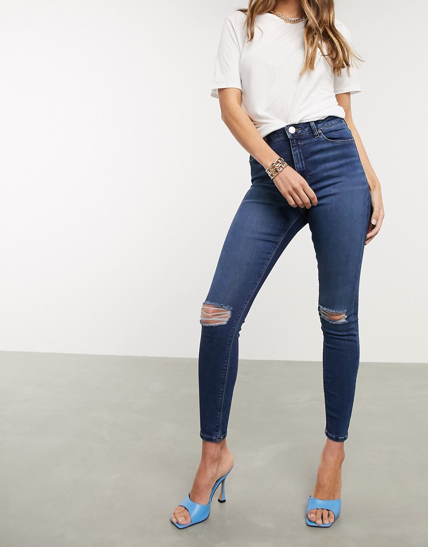 ASOS DESIGN Ridley high waisted skinny jeans in dark stonewash blue with busted knees