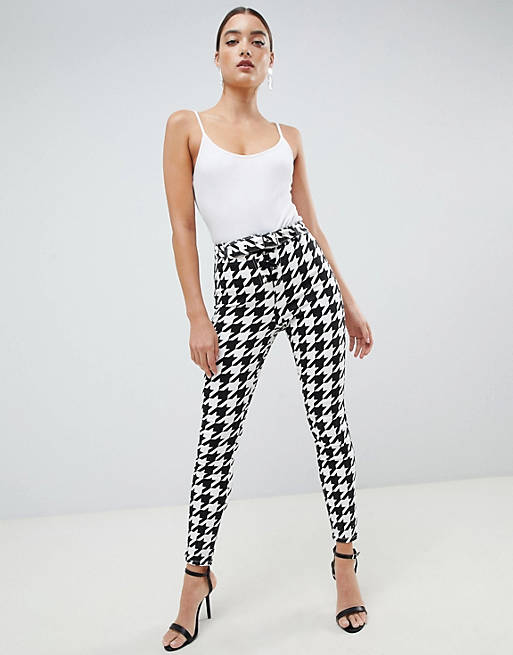 ASOS DESIGN Ridley high waisted skinny jeans in dogtooth print with corset belt detail