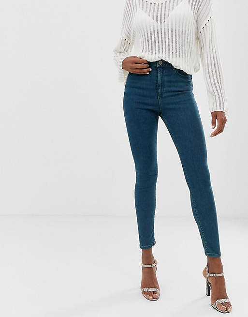 ASOS DESIGN Ridley high waisted skinny jeans in mid wash with green tint