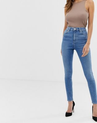 ASOS DESIGN Ridley high waisted skinny jeans in pretty mid stonewash ...