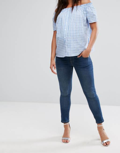 ASOS DESIGN Ridley Maternity – Niebieskie jeansy o obcisłym kroju z podwyższonym stanem, talią nad brzuch i efektem sprania