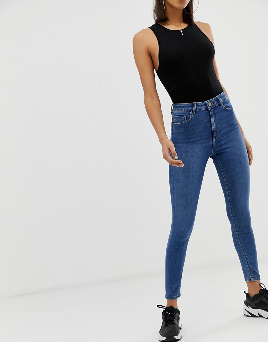 ASOS DESIGN - Ridley - Skinny jeans met hoge taille en midblauwe wassing