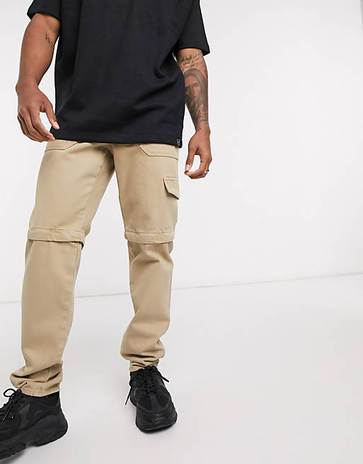 ASOS DESIGN rigid slim jeans in stone with zip off details | ASOS