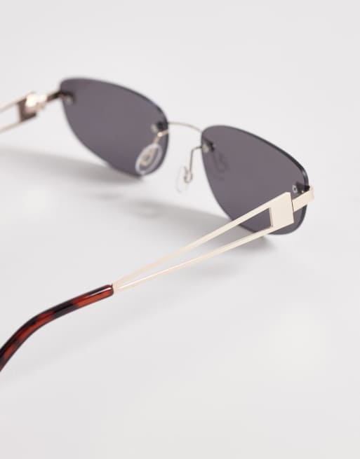 ASOS DESIGN rimless rectangle sunglasses in gold metal with smoke lens, 2 of 3