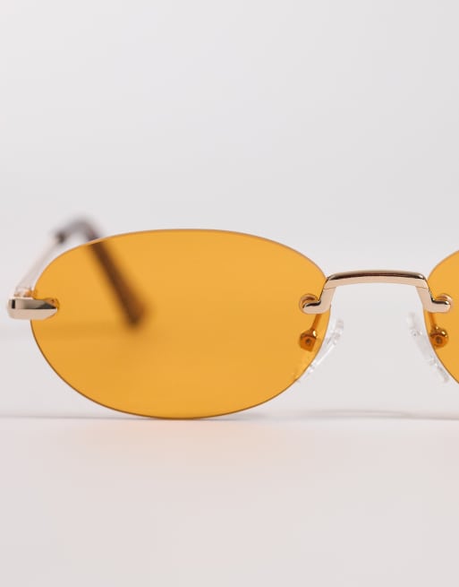 ASOS DESIGN rimless sunglasses in gold metal frame with amber lens, 2 of 3