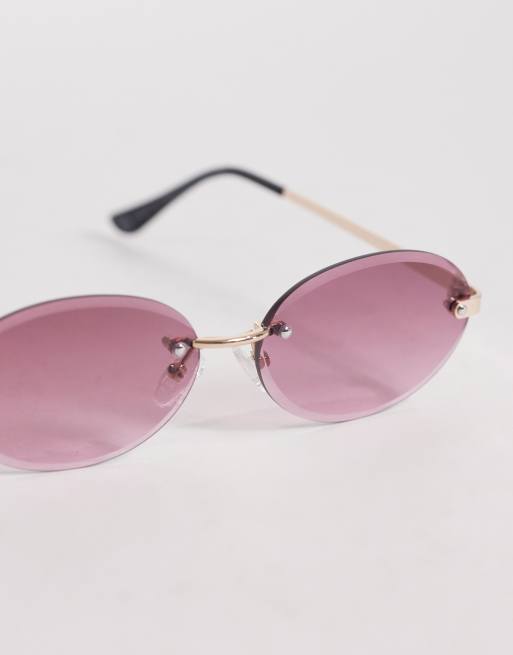 ASOS DESIGN rimless sunglasses in gold metal frame with purple gradient lens, 2 of 3