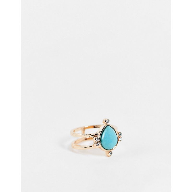 DESIGN – Ring in Goldoptik mit Steindetail in Blau