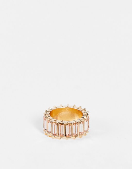 ASOS DESIGN - Ring met roze baguette-steentjes in goudkleur