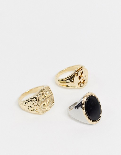ASOS DESIGN ring pack with black onyx stone and varsity design in silver and gold tone
