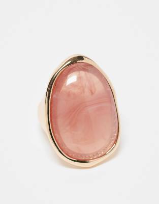 ring with pink faux semi precious style stone in gold tone