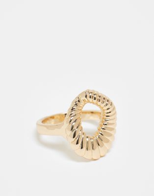ring with textured open oval design in gold tone