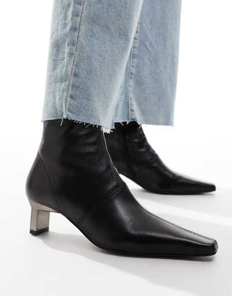 ASOS DESIGN Rise premium leather boots with metal heel detail in black - view 1