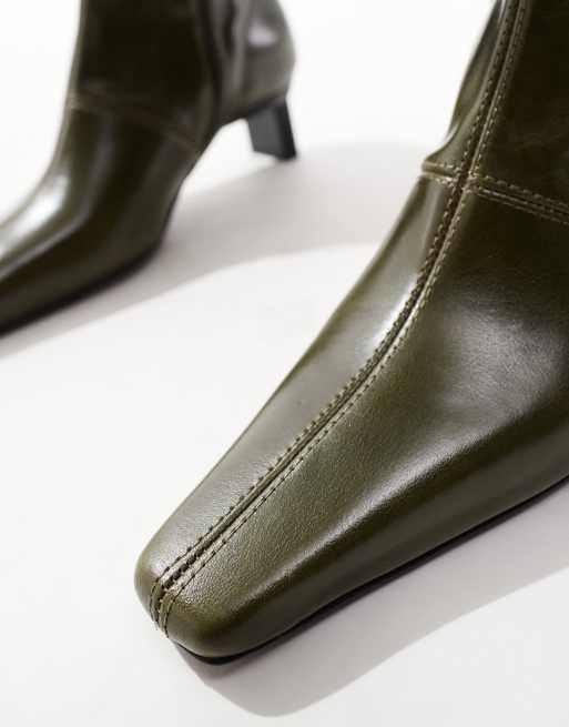 ASOS DESIGN Rise premium leather boots with metal heel detail in green olive