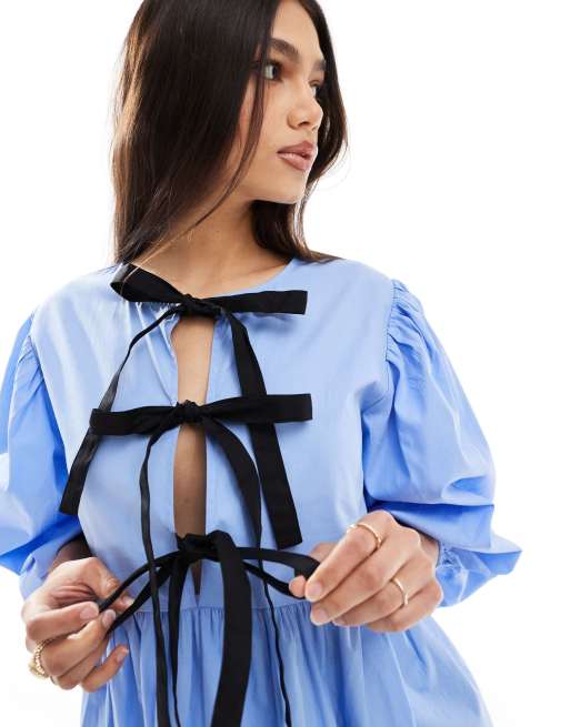 ASOS DESIGN Robe babydoll courte avec n uds a l avant Bleu ciel