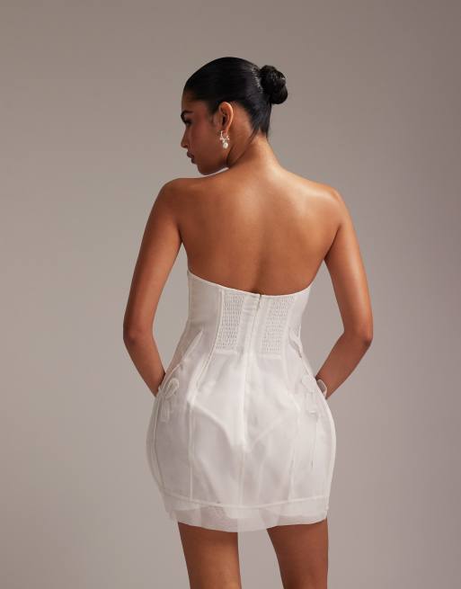 ASOS DESIGN bandeau mini dress with trailing 3D flowers in white