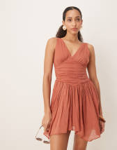 ASOS DESIGN - Robe courte avec jupe évasée et détail volanté - Jaune