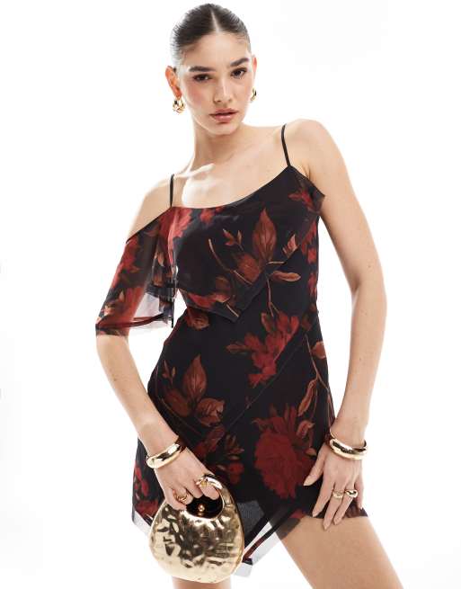 ASOS DESIGN - Robe courte à fleurs avec bords effilochés et ourlet asymétrique - Rouge et noir