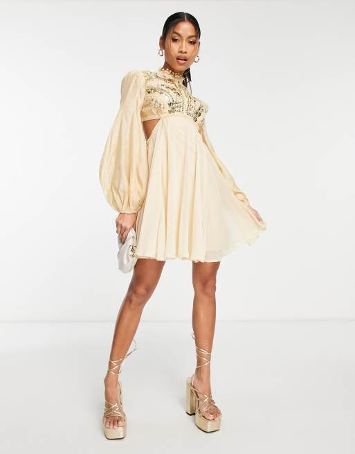 ASOS DESIGN Robe courte a manches bouffantes avec decoupes effet cage a strass Beige ASOS