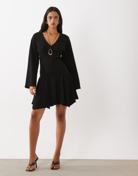 ASOS DESIGN robe courte en velours côtelé souple à ourlet pointu noire - view 1