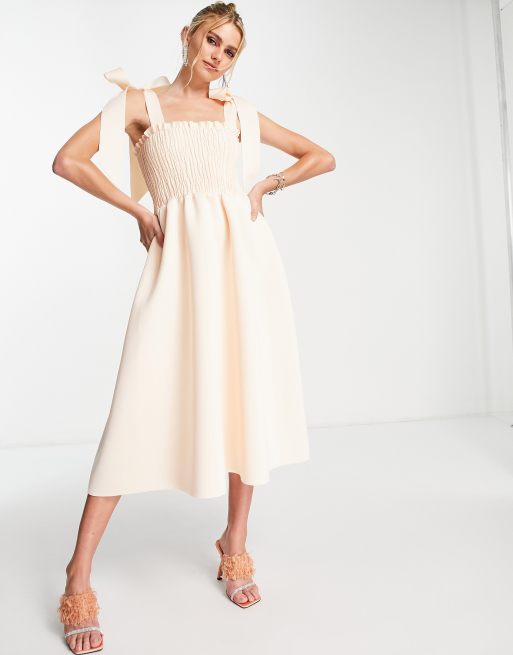 ASOS DESIGN Robe de bal de promo mi longue froncee en satin a liens a nouer Creme