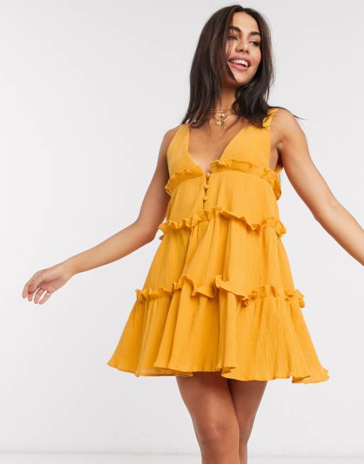 ASOS DESIGN Robe d t courte volants avec boutons sur le devant et effet froiss textur Jaune moutarde