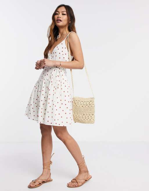 ASOS DESIGN - Robe d'été courte cache-cœur effet froissé à pois avec liens à nouer