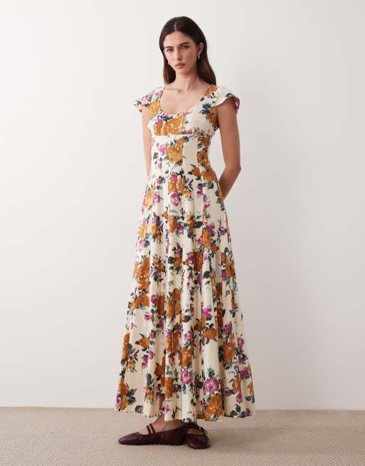 ASOS DESIGN - Robe longue à fleurs et godets avec encolure dégagée et manches courtes - Multicolore