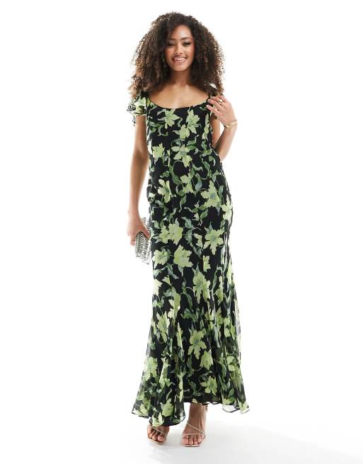 FhyzicsShops DESIGN - Robe longue coupée en biais à encolure échancré et manches volantées - Imprimé fleurs noir et vert