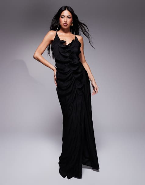 ASOS DESIGN - Robe longue plissée à bretelles avec volants en cascade et fleur - Noir - view 1