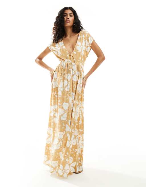 ASOS DESIGN - Robe longueur mollet manches courtes en tissu froissé à fleurs avec col en V et liens devant - Marron