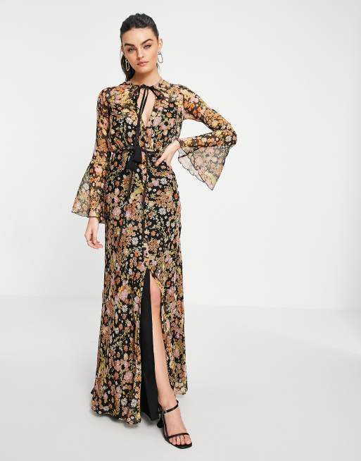 ASOS DESIGN - Robe mi-longue à petites fleurs avec poignets évasés et pampille